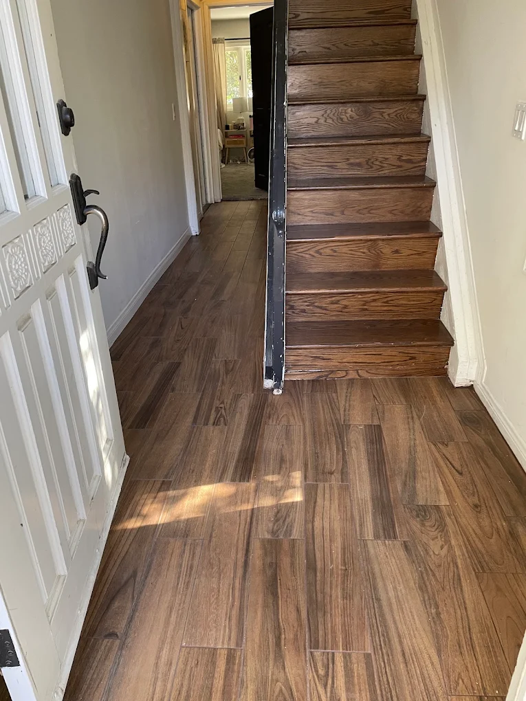 Entry flooring & refinished oak staircase