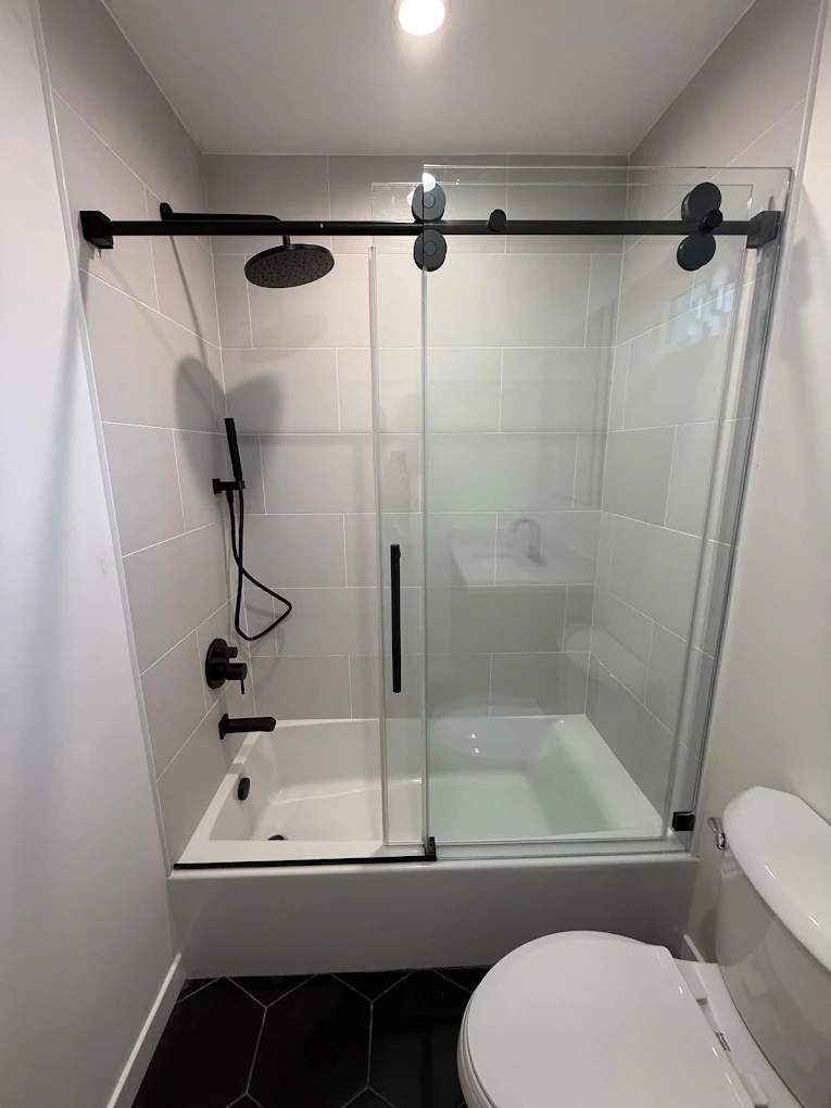 Tub-shower combo with matte-black fixtures