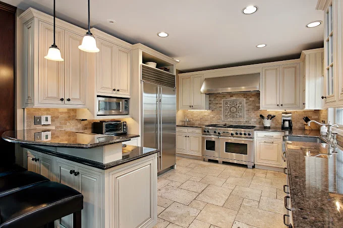 Traditional kitchen with granite counters & tile floor