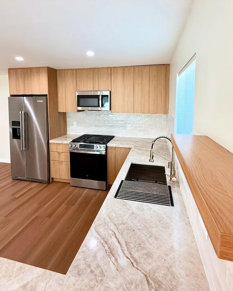 Full kitchen remodel — white oak cabinets & quartz counters