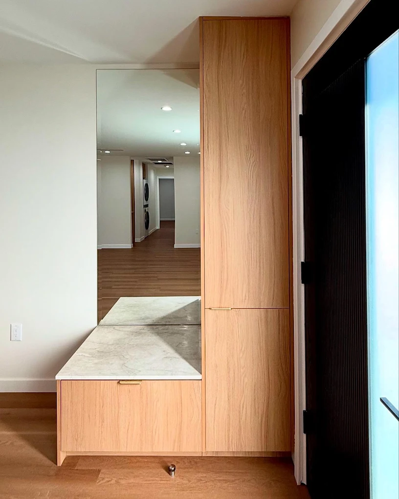 Custom oak entry bench & storage cabinetry