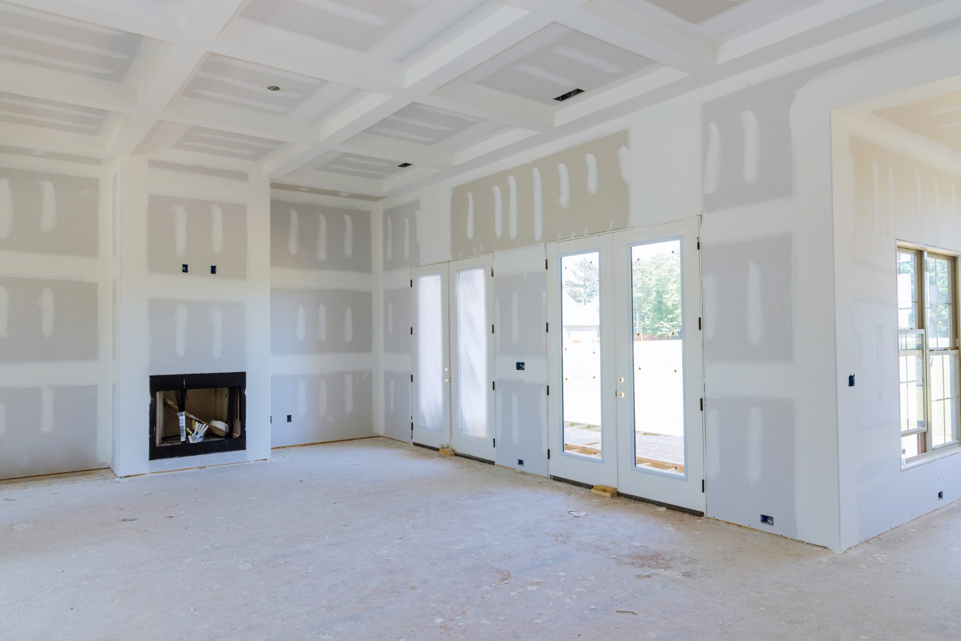 Freshly hung and taped drywall interior