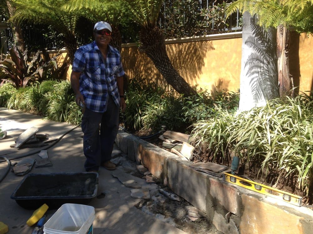 Stone retaining wall & garden hardscape