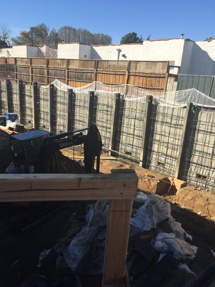Retaining wall & fence line